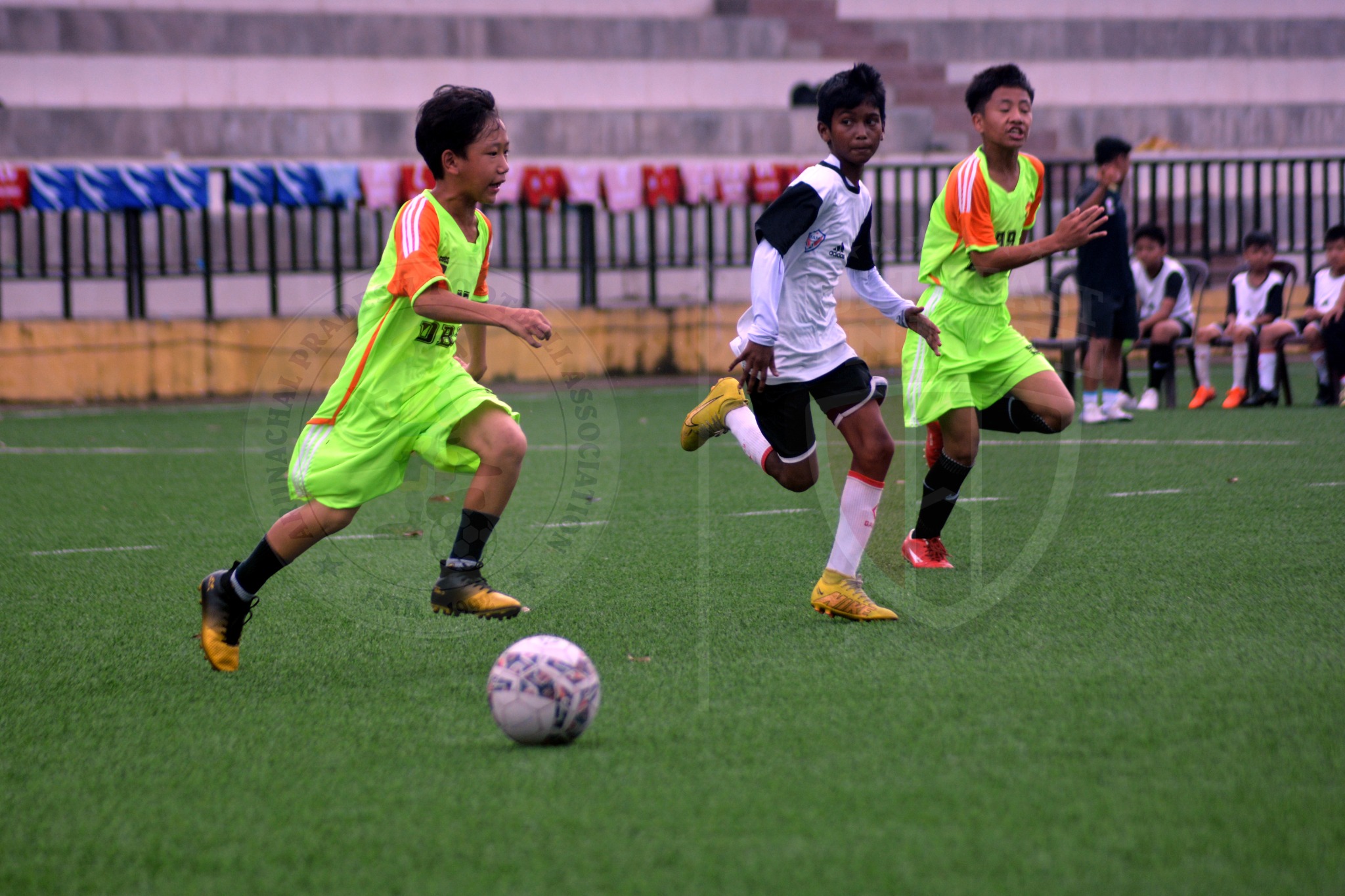 Young football players competing on the field